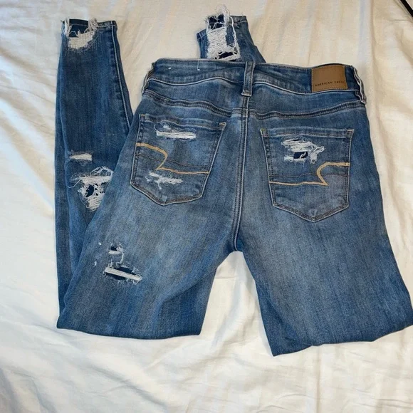 Sold to Elizabeth// 
American Eagle Ripped Tapered Jeans - Picture 4 of 9